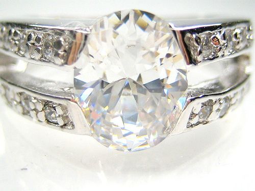 5CT OVAL DIAMONIQUE 18K CLAD BAND RING 7 & O  