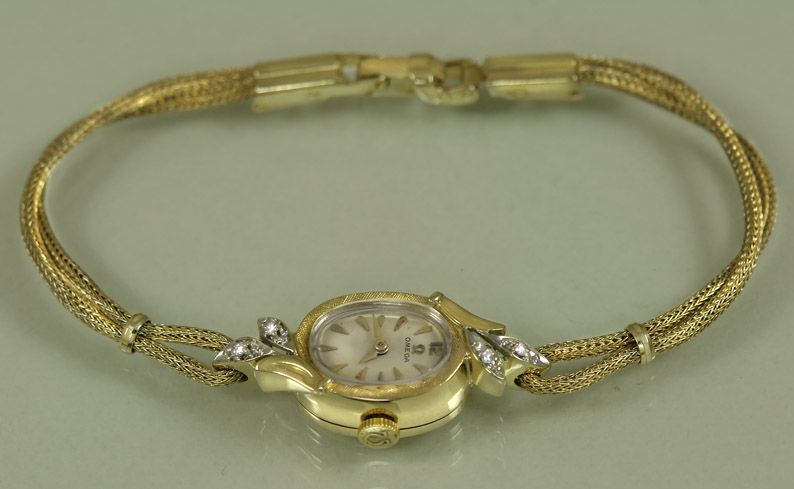 14k SOLID GOLD Omega ladies watch, 14k SOLID GOLD CLASP, 4 Genuine 