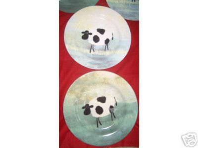 decorator stoneware 8 plates, cow theme  