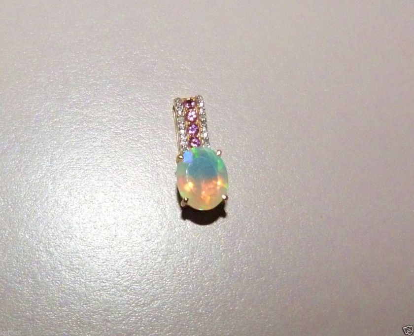   60 FACETED ETHIOPIAN OPAL, PINK TOURMALINE & DIAMOND PENDANT  