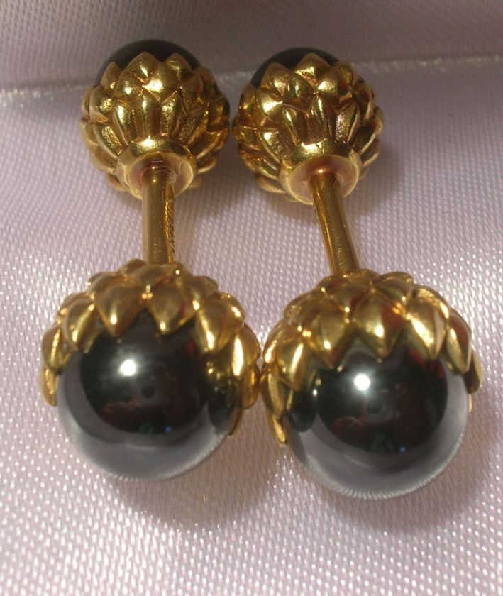 am proud to present this REMARKABLE 18K Gold pair of unique 